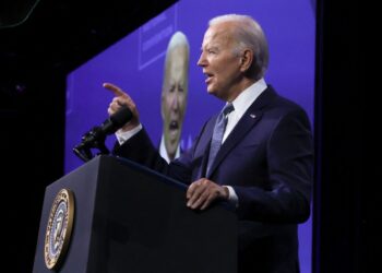 Biden pledges ‘I am all in,’ criticizes Trump on policy
