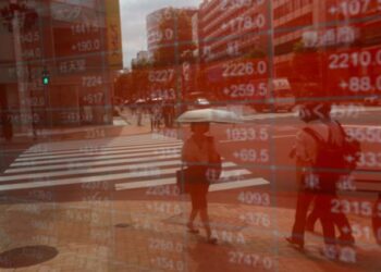 Asian shares set to end brutal week on a high, yen under pressure