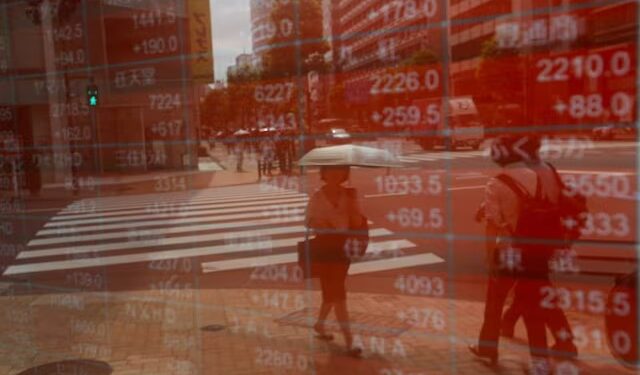 Asian shares set to end brutal week on a high, yen under pressure
