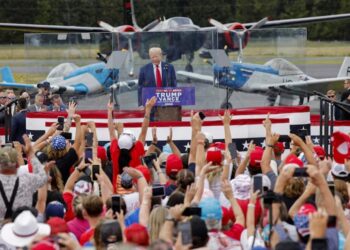 Trump speaks from behind bulletproof glass at 1st outdoor rally since Butler shooting