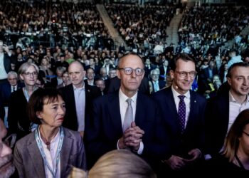 German voters head to polls facing world of change as far right waits in the wings