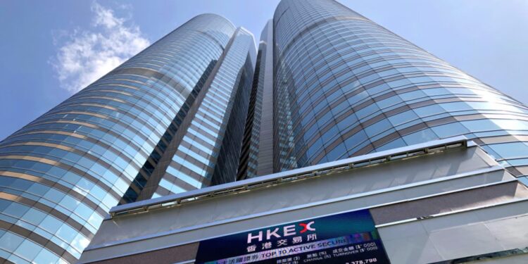 Hong Kong stocks and kiwi rise on China outlook