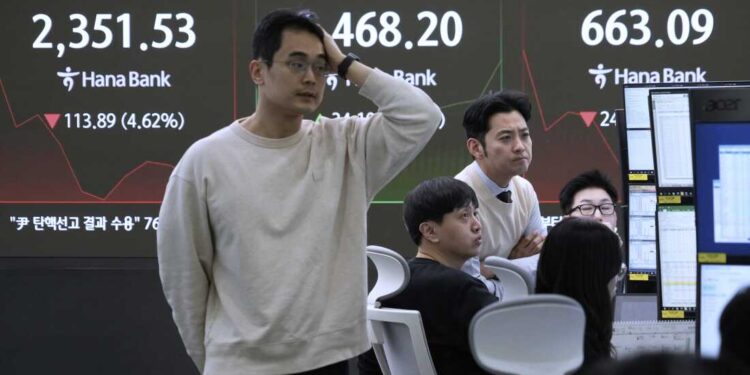 Nikkei plunge nears 9% as Japanese bank stocks plummet