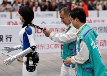 China pits humanoid robots against humans in half-marathon for first time