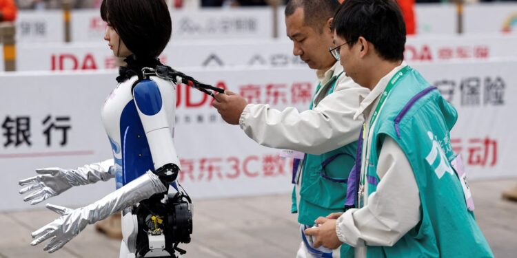 China pits humanoid robots against humans in half-marathon for first time