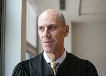 Judge opens criminal contempt proceedings against trump officials