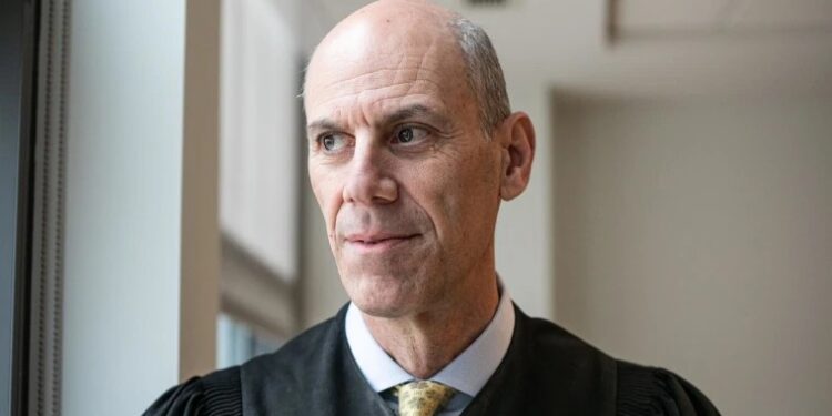 Judge opens criminal contempt proceedings against trump officials