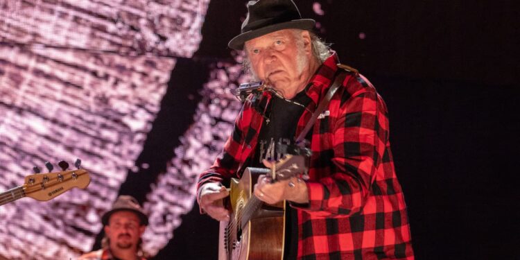 Neil Young says he may be barred from returning to US over Donald Trump criticism