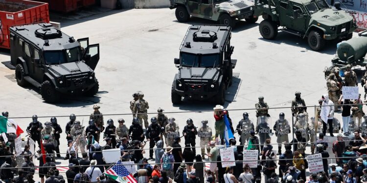 Tensions rise in Los Angeles amid curfew and Trump feud