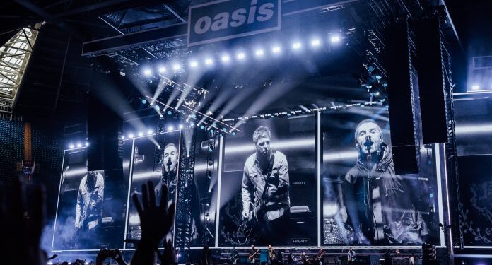 Oasis return with thunderous Cardiff comeback