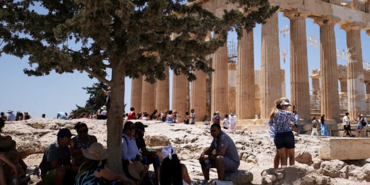 Do heatwaves, wildfires and travel costs signal the end of the holiday abroad?