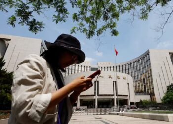China holds benchmark lending rates steady as expected