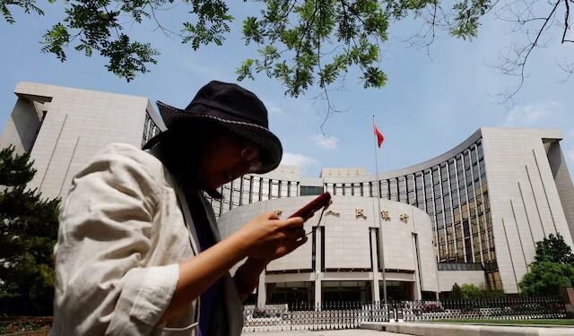 China holds benchmark lending rates steady as expected