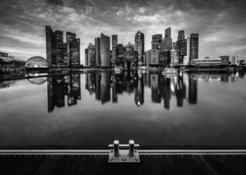 Singapore opens steady as investors await clearer regional direction