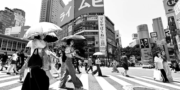 Tokyo workers encouraged to wear shorts to cut energy costs and keep cool