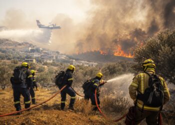Three firefighters die as wildfires tighten grip on southern Europe