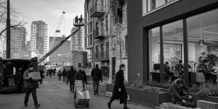 Ukraine’s economy keeps moving under fire